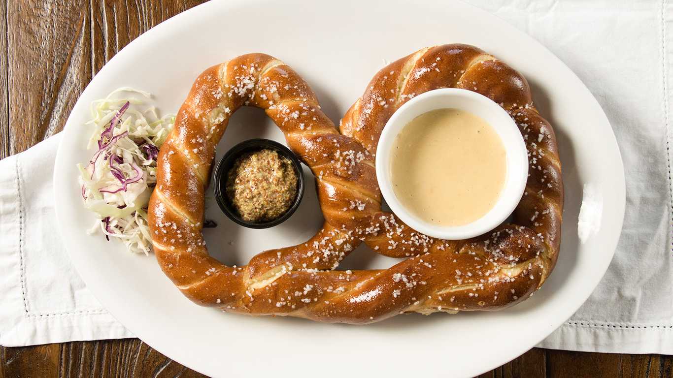 Order Giant Pretzel & Guinness Cheese food online from Hooleys Public House store, La Mesa on bringmethat.com