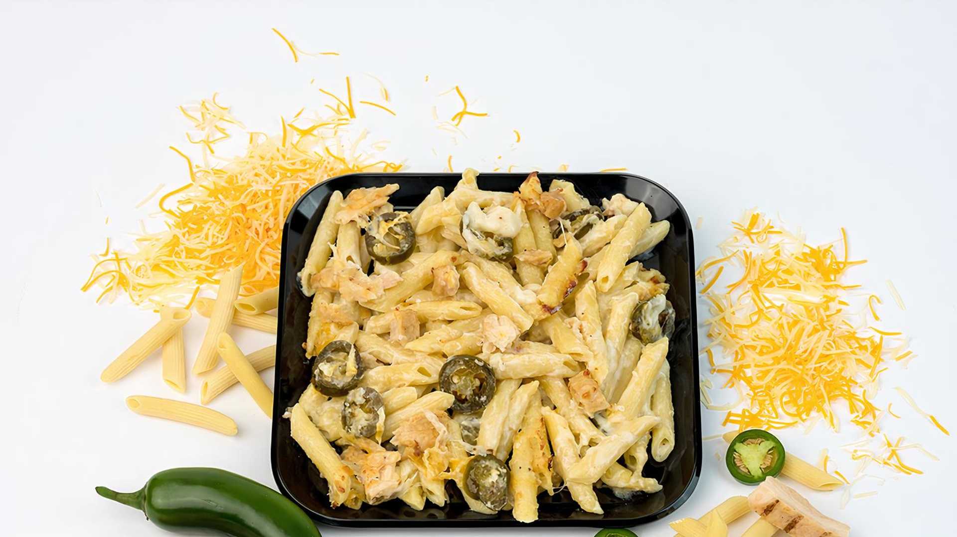 Order Chicken & Jalapeño Alfredo Pasta w/mozzarella & cheddar cheese food online from Mama Deluca's Pizza store, Shelby Charter Twp on bringmethat.com