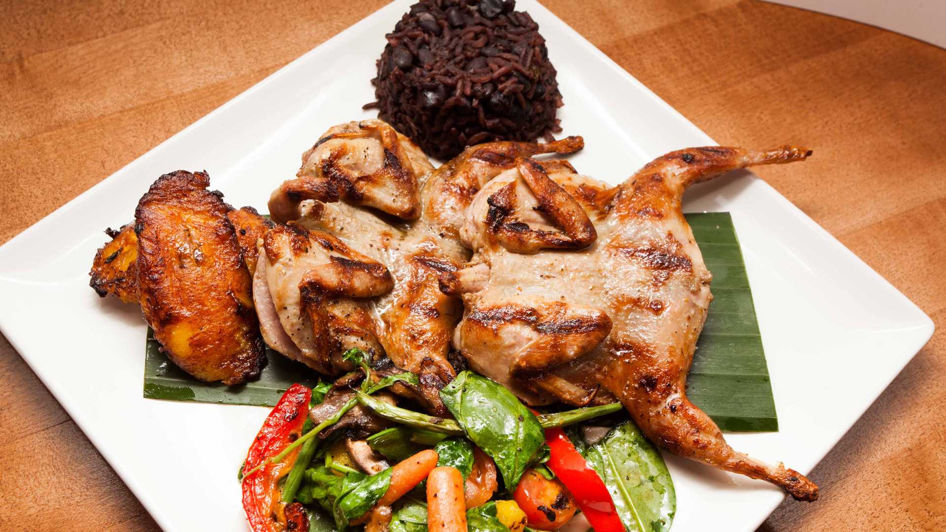 Order Grilled Quail food online from Gloria's Latin Cuisine store, Dallas on bringmethat.com
