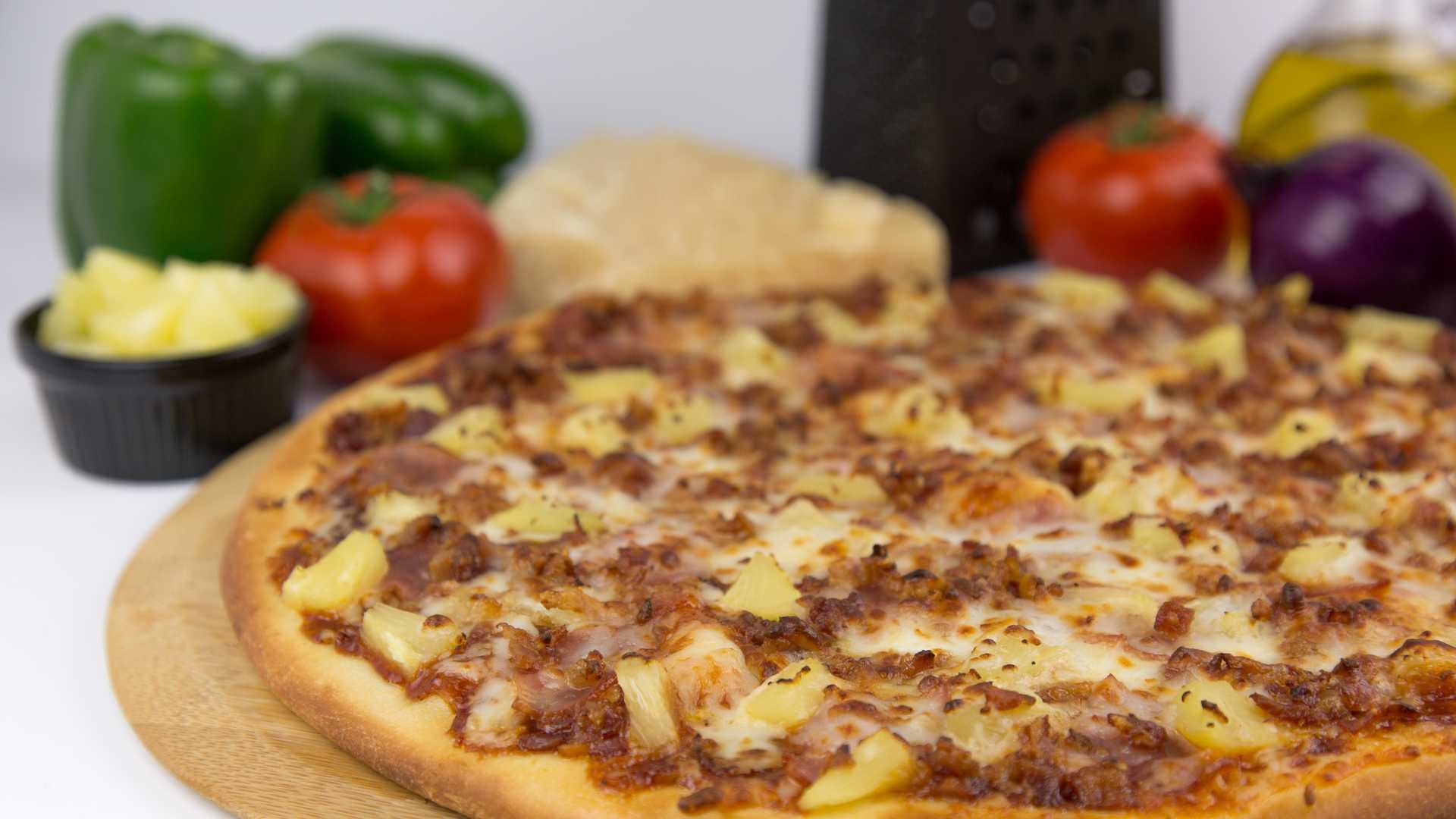 Order Hawaiian (Pineap,Ham,Bacon) food online from Mama Deluca's Pizza store, Shelby Charter Twp on bringmethat.com
