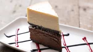 Order DOUBLE-DECKER CHEESECAKE food online from Village Tavern store, Charlotte on bringmethat.com