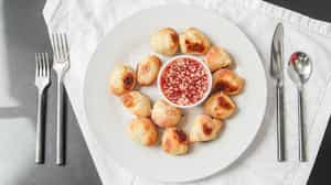 Order Garlic Knots ￼ food online from Racanelli's New York Pizzeria store, Webster Groves on bringmethat.com