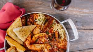 Order FAMOUS DUNGENESS CRAB CIOPPINO food online from The Fish Market - San Mateo store, San Mateo on bringmethat.com