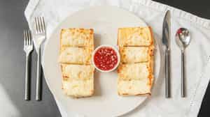 Order Cheesy Garlic Bread ￼ food online from Racanelli's New York Pizzeria store, Webster Groves on bringmethat.com