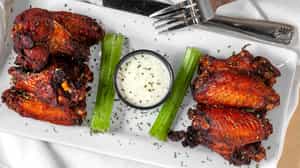 Order 6pc Boom Boom Wings food online from Boombozz Pizza & Watch bar- Louisville Highlands store, Louisville on bringmethat.com