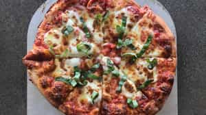 Order Margherita Pizza (12") food online from Amici's Kitchen and Living Room store, Berkley on bringmethat.com
