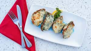 Order BAKED OYSTERS ROCKEFELLER (4) food online from The Fish Market - San Mateo store, San Mateo on bringmethat.com