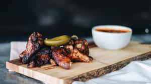 Order FIRE-KISSED WINGS (10 PIECE) food online from Jack Stack Barbecue - Martin City store, Kansas City on bringmethat.com