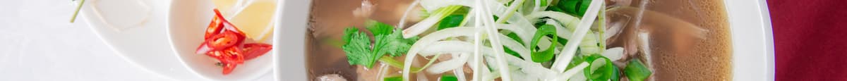 34. Combination Beef Flat Rice Noodle Soup  