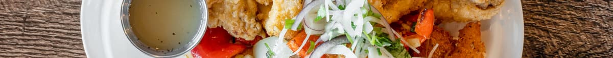 7. Combo shrimps, calamari, chicken wings with salt  and pepper/ Tôm, Mực, cánh gà rang muối 