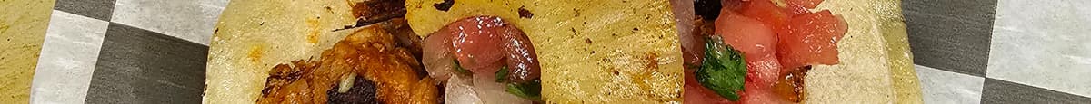 Alpastor (spicy marinatedpork with fresh pineapple) Taco