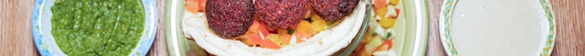 Purple falafel in a pita