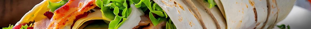 Lawrence - Oven gold turkey, cheddar, bacon, avocado, lettuce, tomato & ranch dressing, lettuce