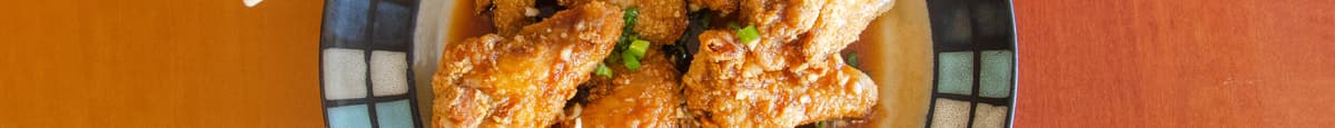 A4 . Chicken Wings with Garlic Sauce