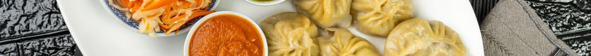 1. Momos (Steamed Tibetan Dumplings)