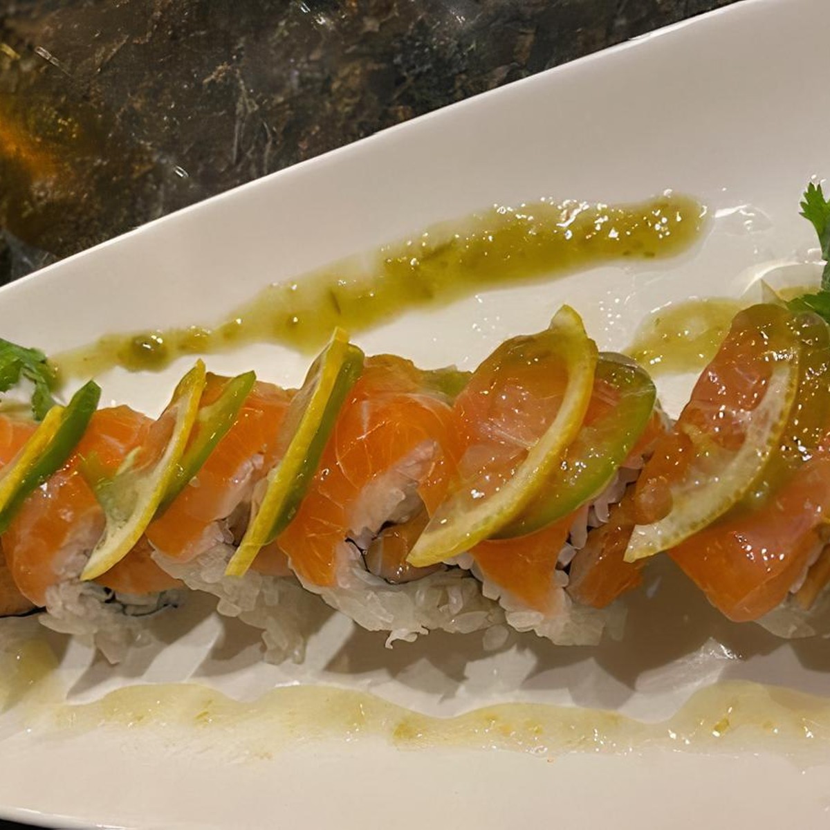 My lunch today! Treated myself to a Lover's roll (tuna, salmon, avocado on  a shrimp tempura and krab roll with eel sauce) and a Crunchy Dragon roll  (tuna and masago over a