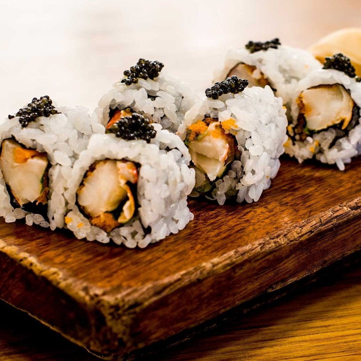 Gunkan Maki Sushi of fish salmon, scallop, perch, eel, shrimp and