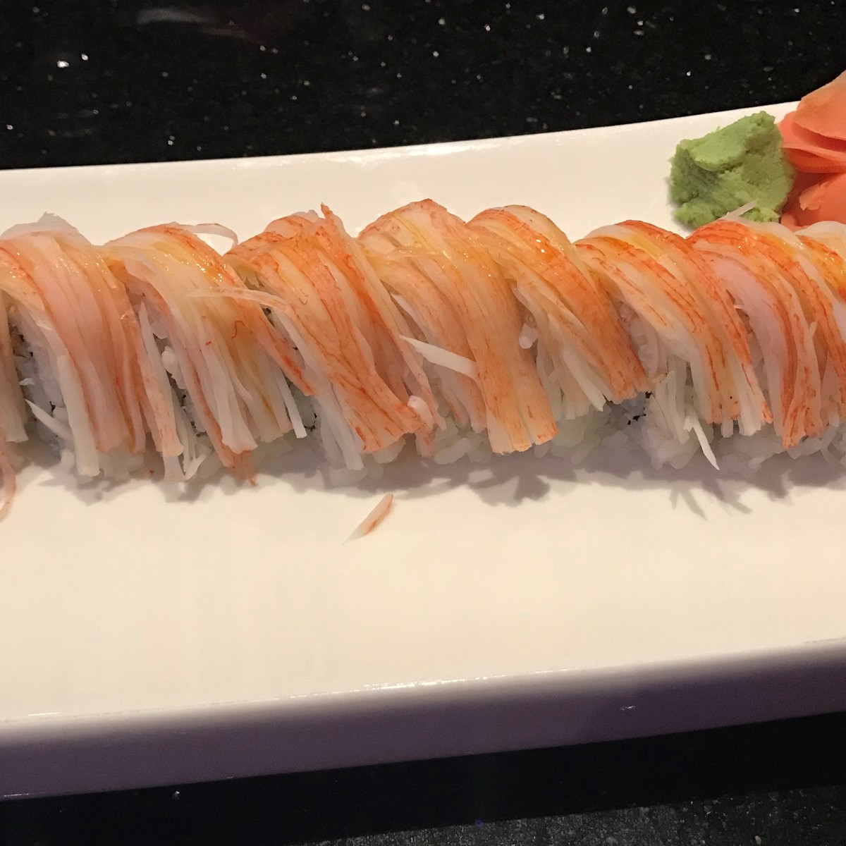 My lunch today! Treated myself to a Lover's roll (tuna, salmon, avocado on  a shrimp tempura and krab roll with eel sauce) and a Crunchy Dragon roll  (tuna and masago over a