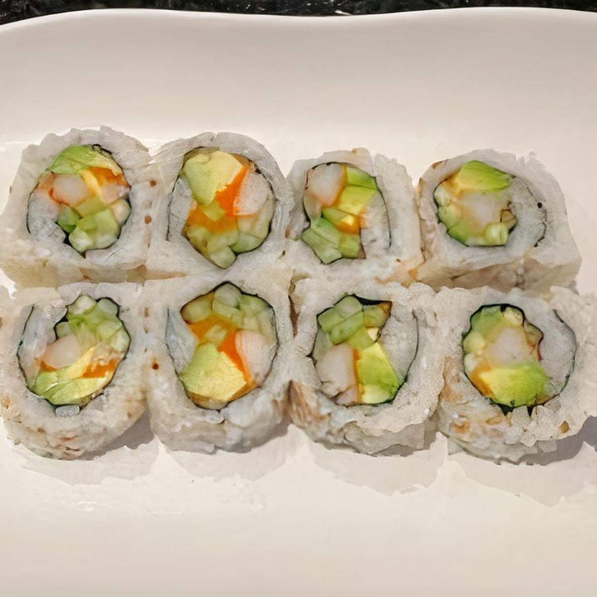 My lunch today! Treated myself to a Lover's roll (tuna, salmon, avocado on  a shrimp tempura and krab roll with eel sauce) and a Crunchy Dragon roll  (tuna and masago over a