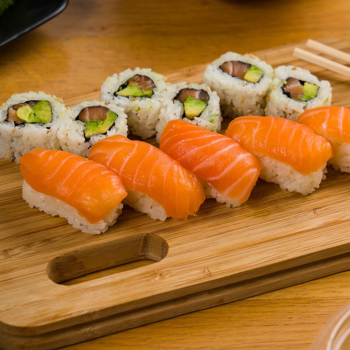 Sushi set featuring sushi, roll, and salmon