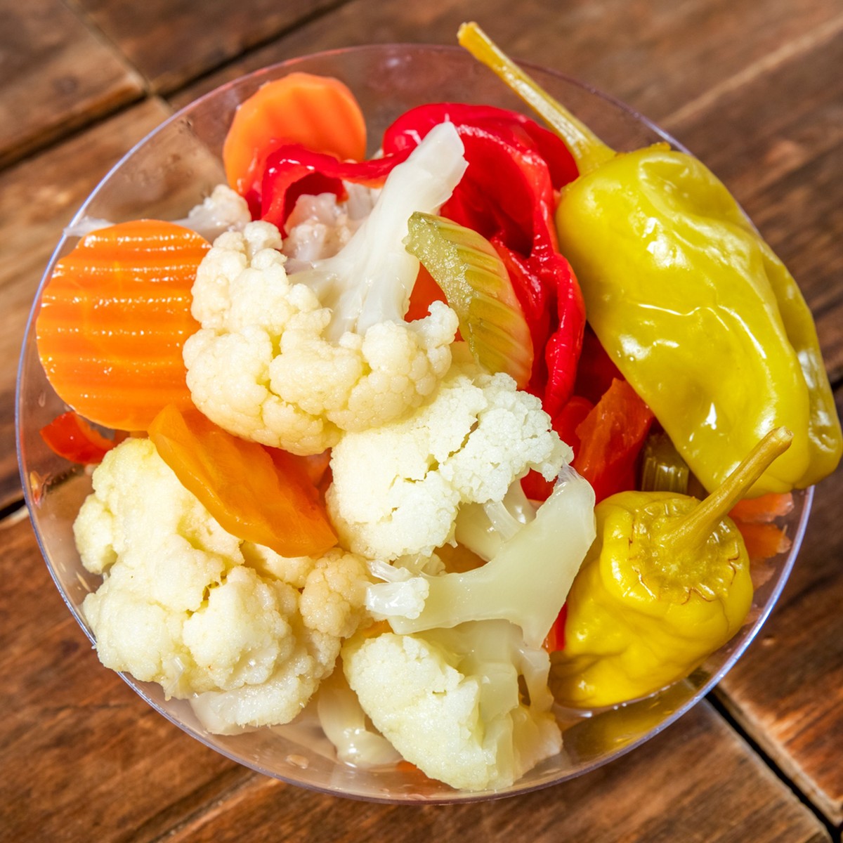 The Pickle Guys Hot Pickled Peppers. Find them at @The Big Dill™ .